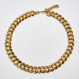 Full view of vintage Monet gold-tone double-link chain necklace with polished finish and adjustable clasp