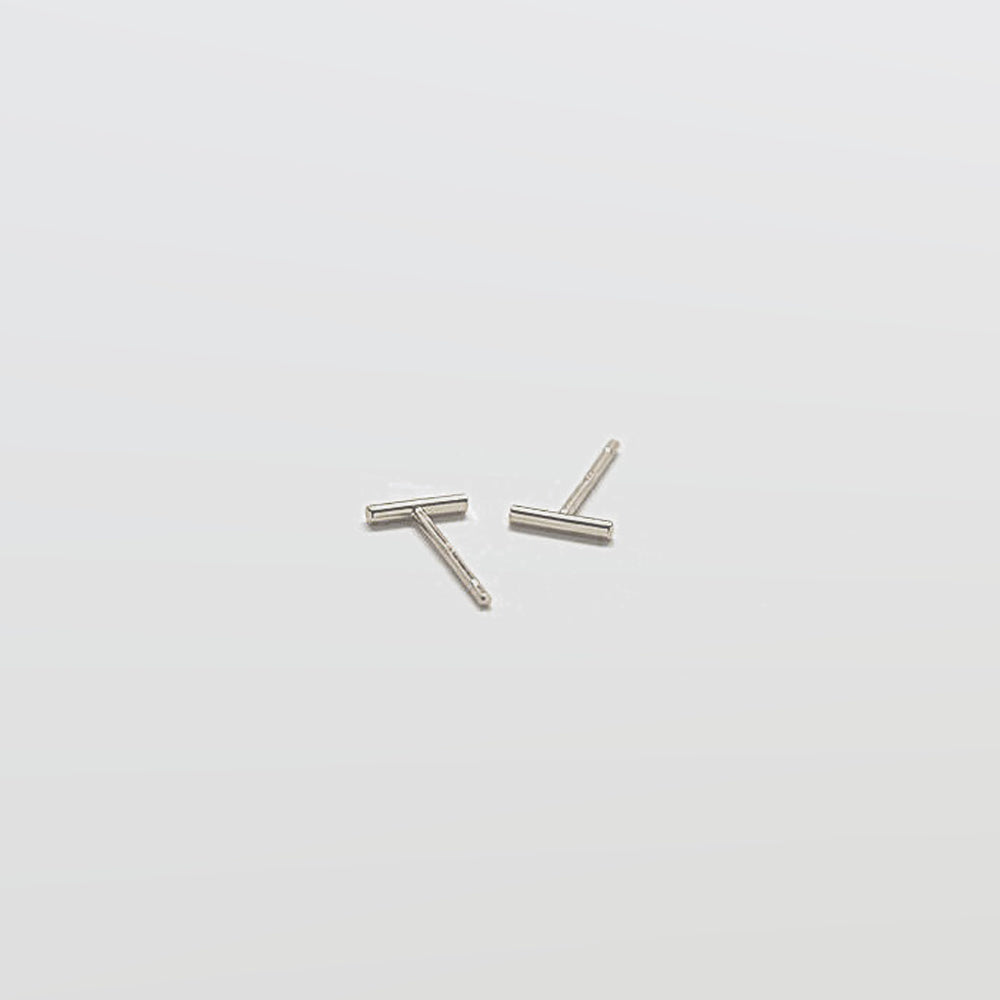 Two silver bar earrings on a white background