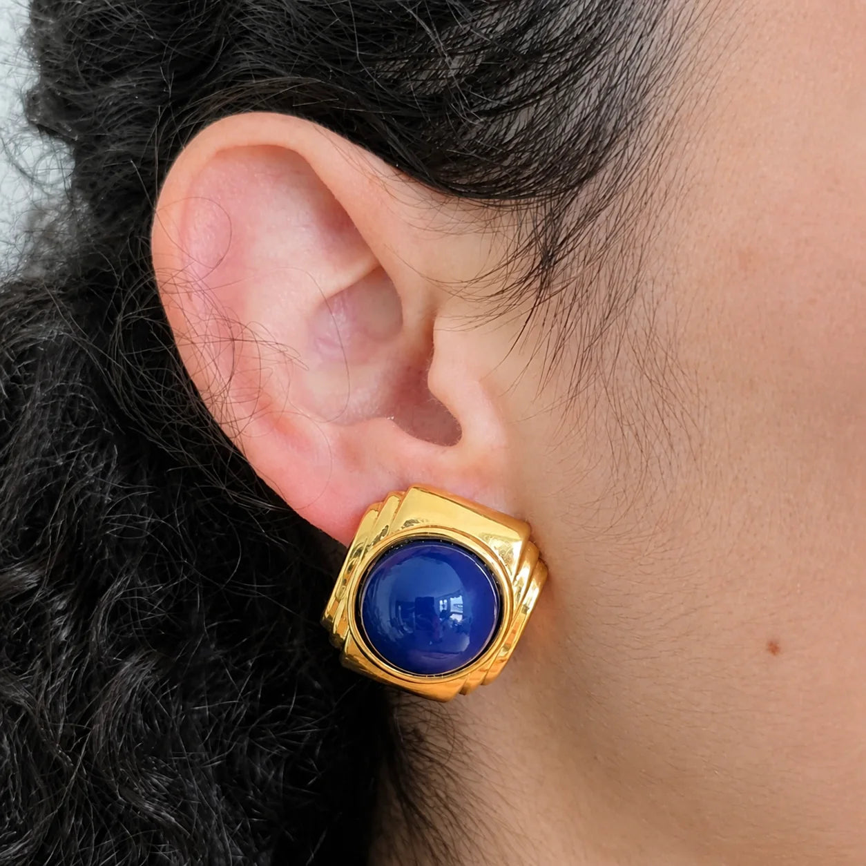 Model wearing Vintage cobalt blue cabochon statement earring, close-up