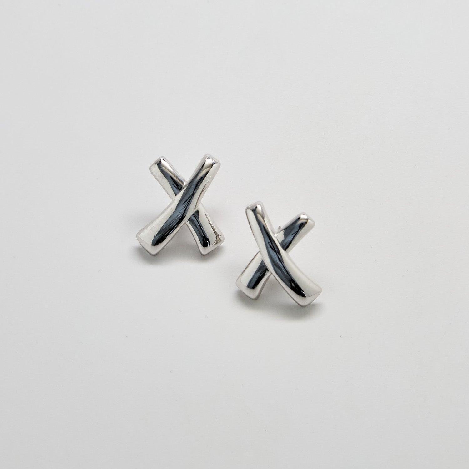 Monet Silver-Tone Crossover Stud Earrings - Admiral Row