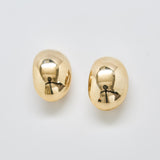Front view of vintage gold-tone dome clip-on earrings with high-polish finish and rounded sculptural design.