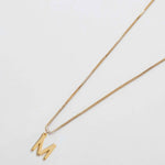 Gold initial necklace with letter M pendant