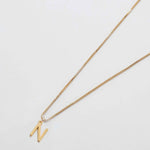 Gold initial necklace with letter N pendant
