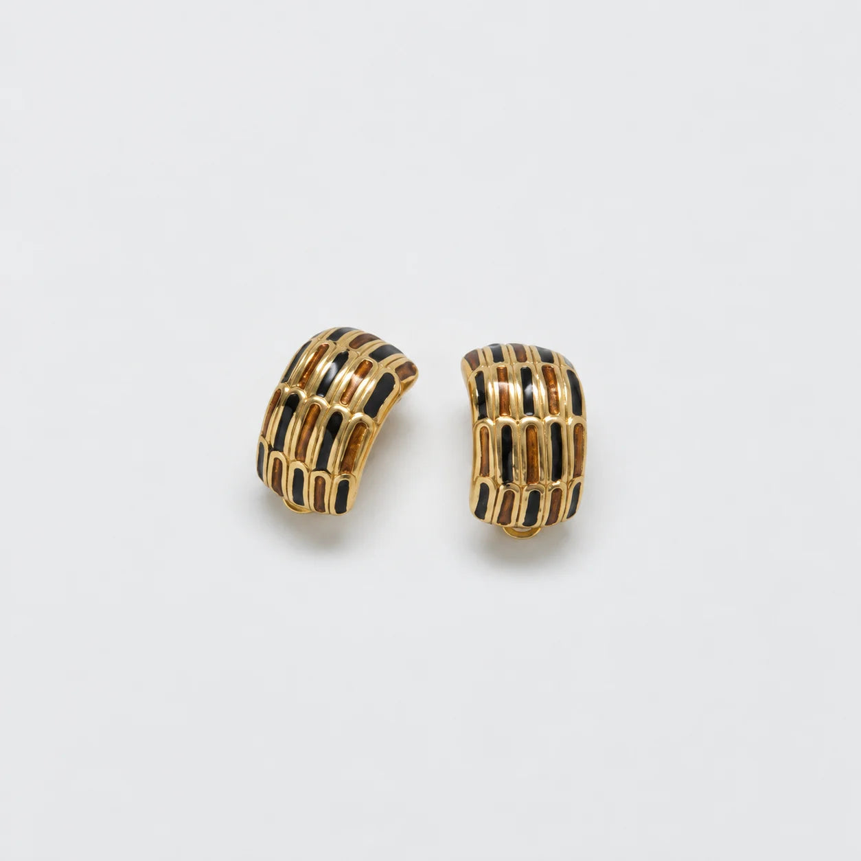 Vintage black-and-gold grid clip-on earrings — front