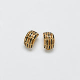 Vintage black-and-gold grid clip-on earrings — front
