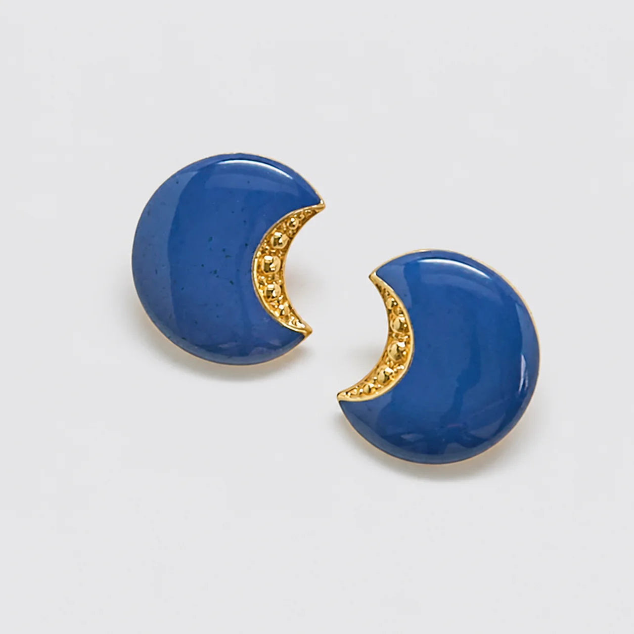 Vintage cobalt blue crescent clip-on earrings, front view