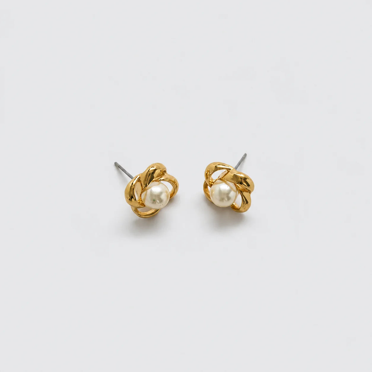 Vintage faux pearl knot stud earrings, front view