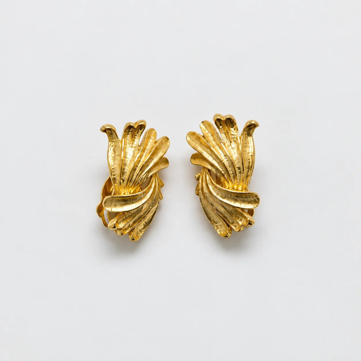 Vintage gold-tone fluted fan clip-on earrings — front