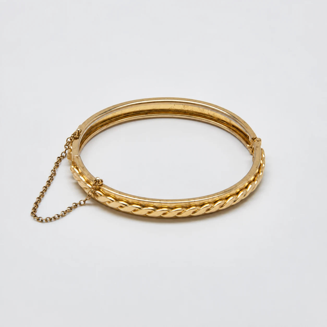Vintage Gold-Tone Braided Hinged Bangle — closed bangle and safety chain