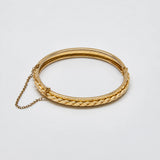 Vintage Gold-Tone Braided Hinged Bangle — closed bangle and safety chain