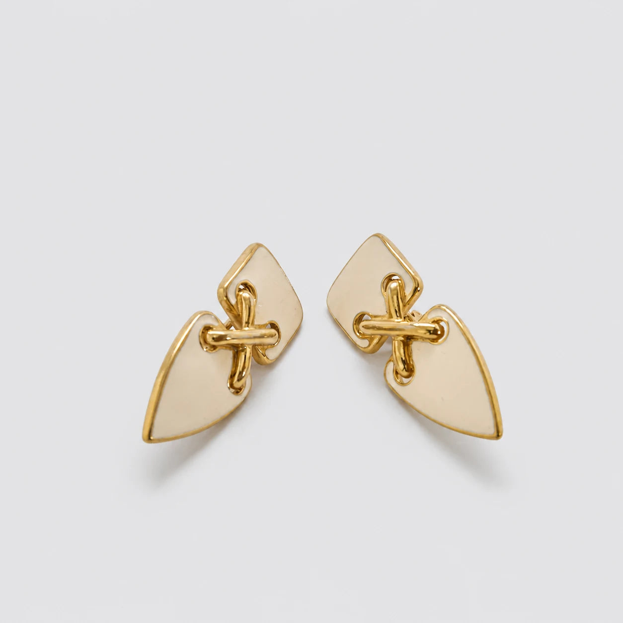Vintage gold-tone ivory geometric clip-on earrings — front pair