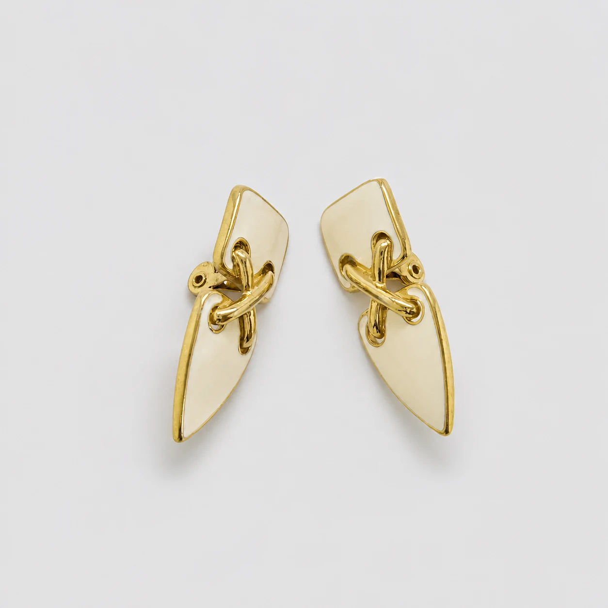 Vintage gold-tone ivory geometric clip-on earrings — clip-back detail