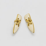 Vintage gold-tone ivory geometric clip-on earrings — clip-back detail