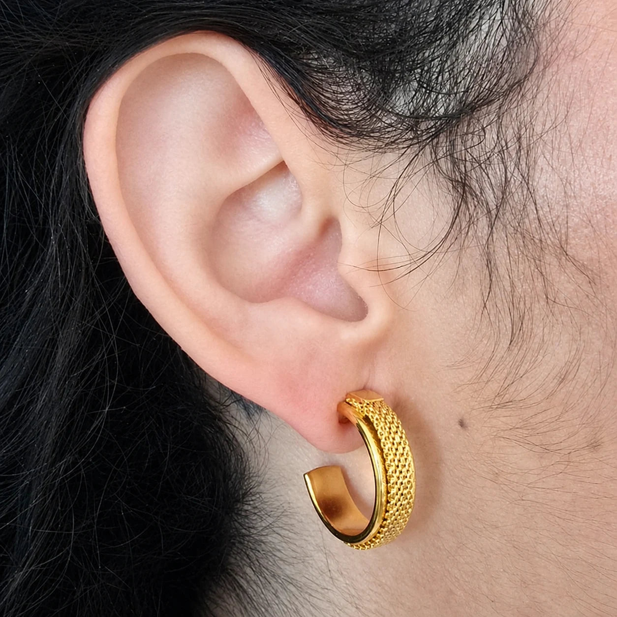 Vintage gold-tone mesh hoop earrings — modeled