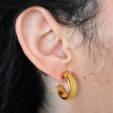 Vintage gold-tone mesh hoop earrings — modeled
