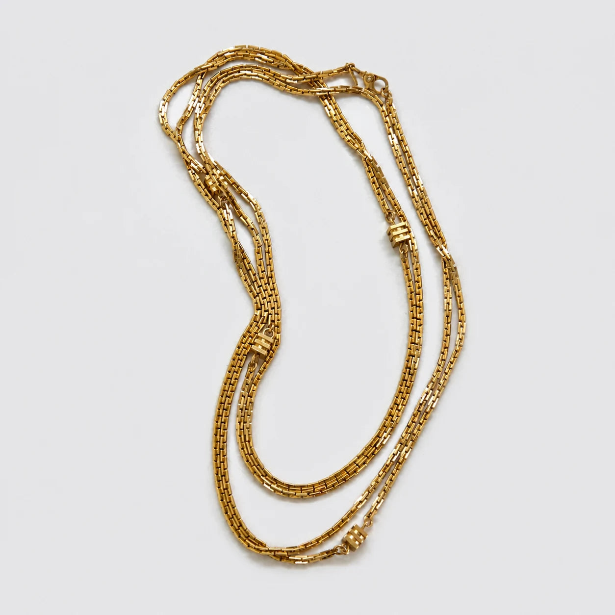 Vintage gold-tone multi-strand box chain necklace — layered view