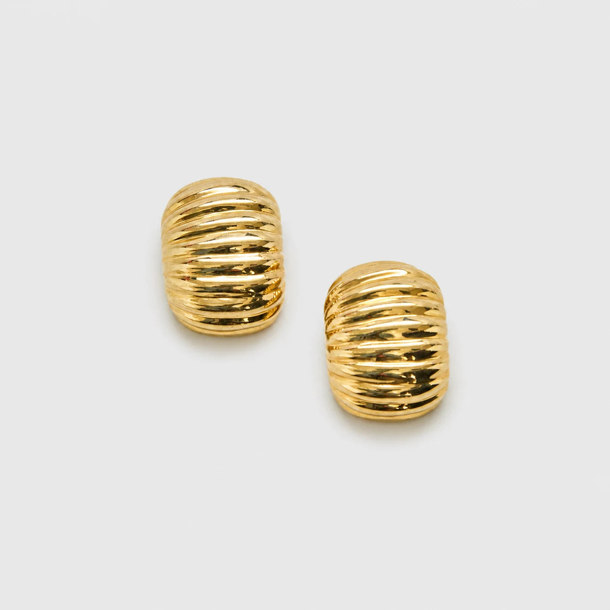 Vintage gold-tone ribbed clip-on earrings — front