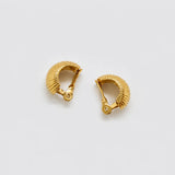 Vintage gold-tone ribbed crescent clip-on earrings — clip-back detail
