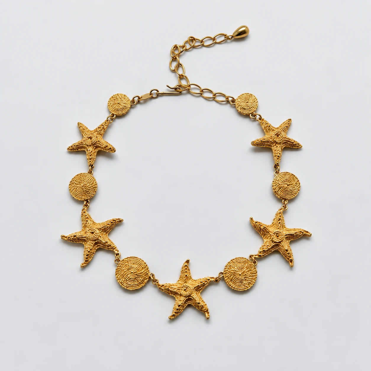 Vintage Gold-Tone Starfish and Spiral Disc Necklace — textured front and extender
