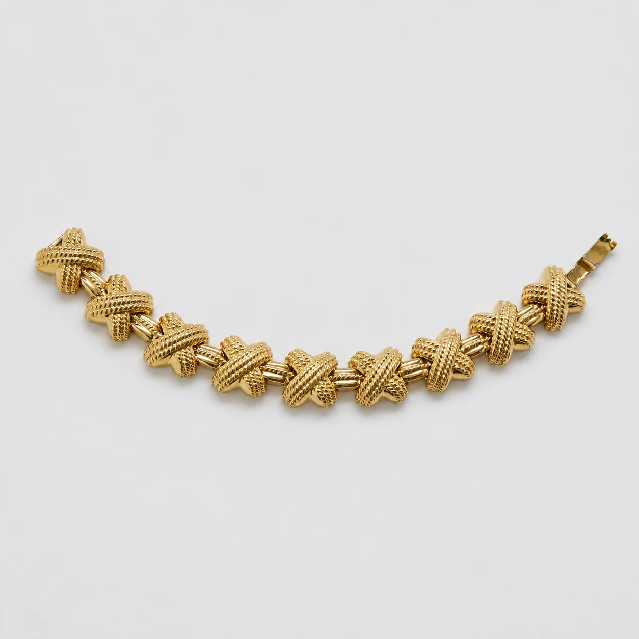 Vintage gold-tone textured knot link bracelet — front