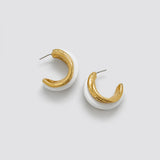 Vintage gold-tone white enamel hoop earrings — open post-back view