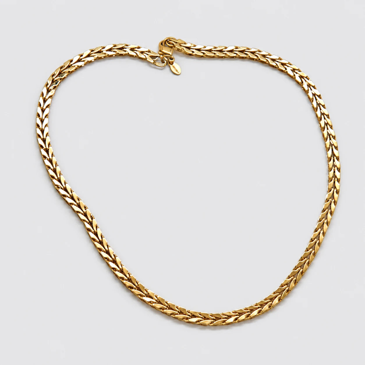 Vintage gold-tone woven chain necklace — clasp and tag detail