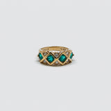 Vintage green and clear stone band ring — front
