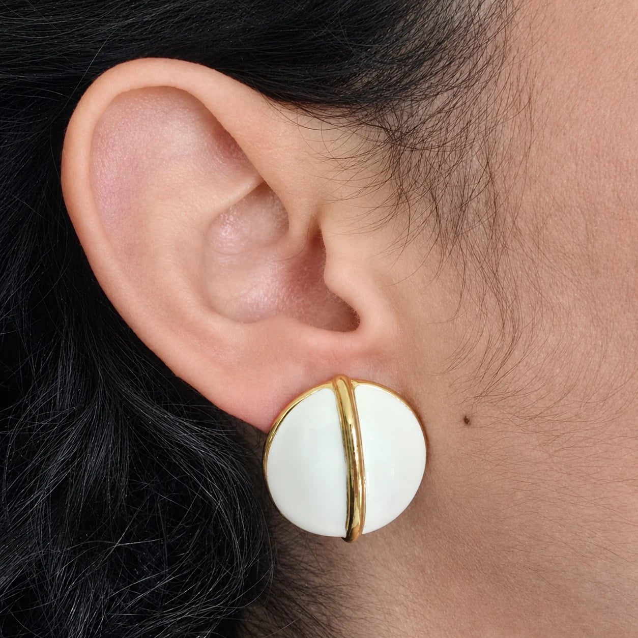 Vintage gold-tone ivory round post earrings — modeled