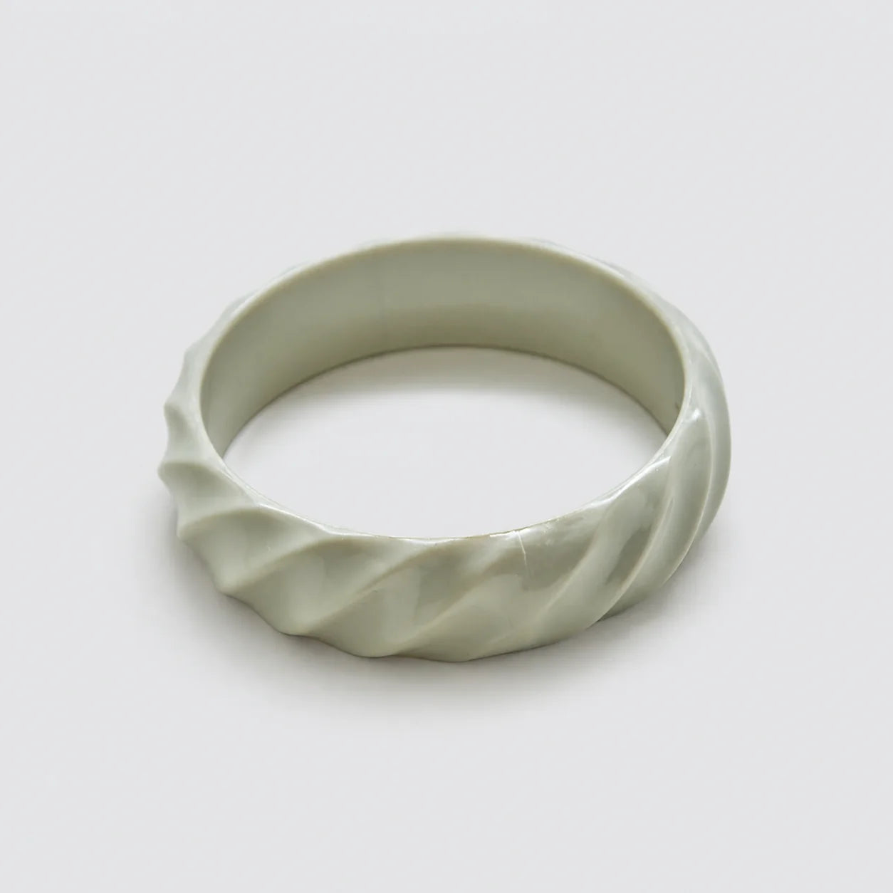 Vintage ivory sculptural resin bangle bracelet, front view