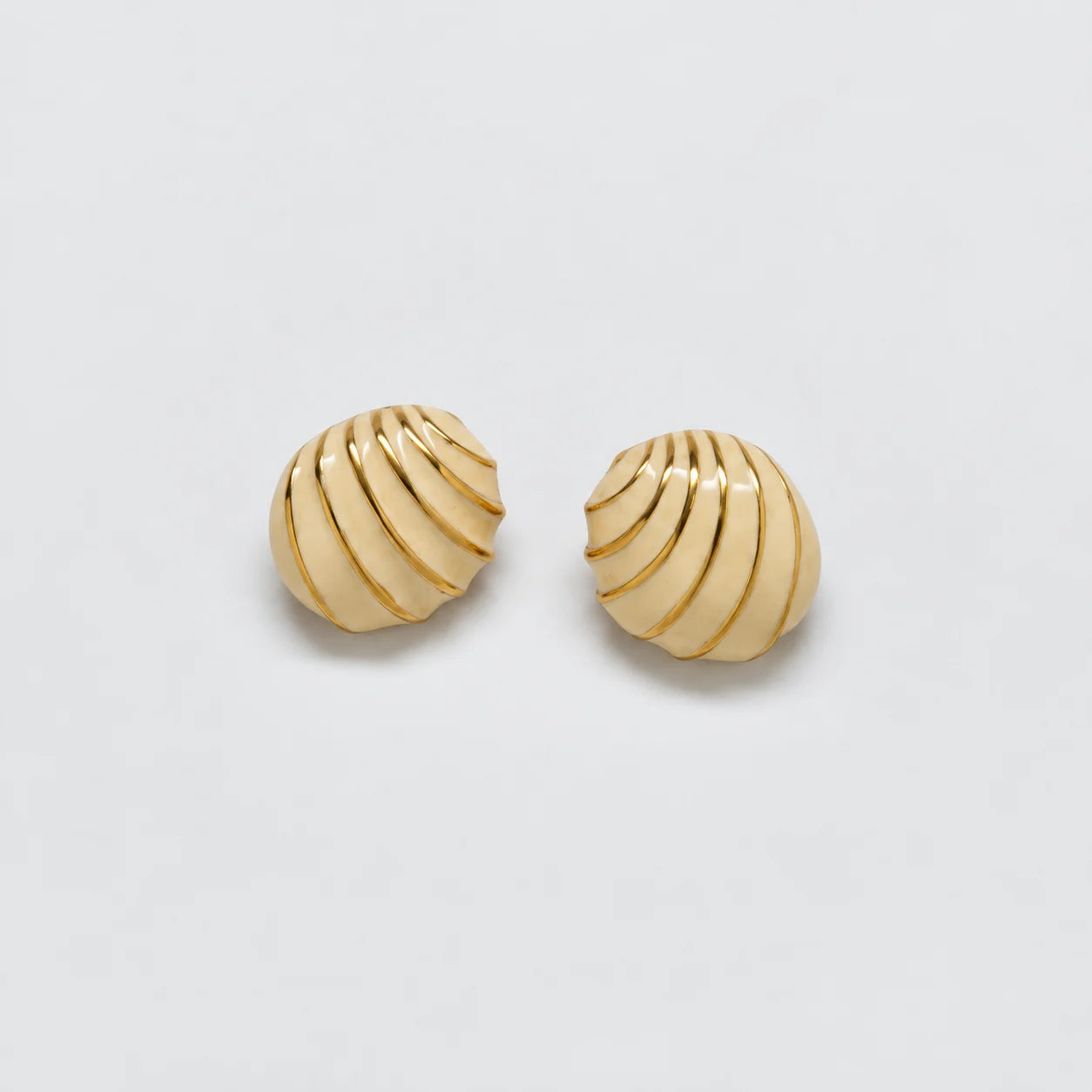Vintage ivory-tone striped shell earrings — front