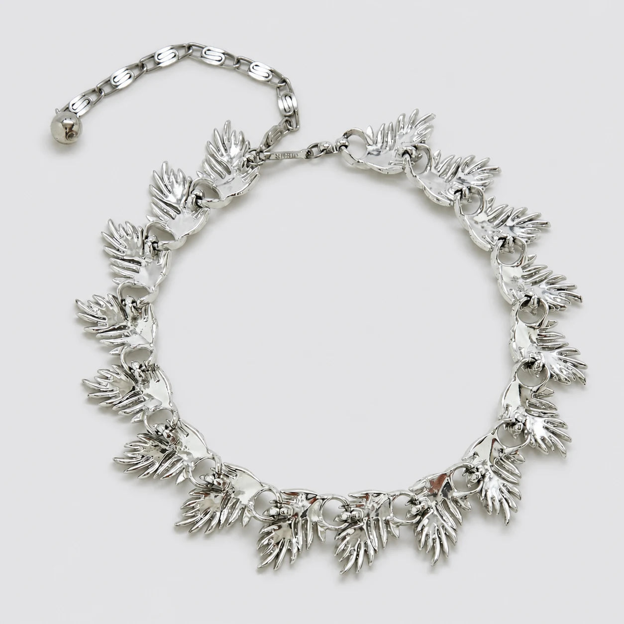 Vintage Lisner silver-tone leaf link necklace — reverse and signature