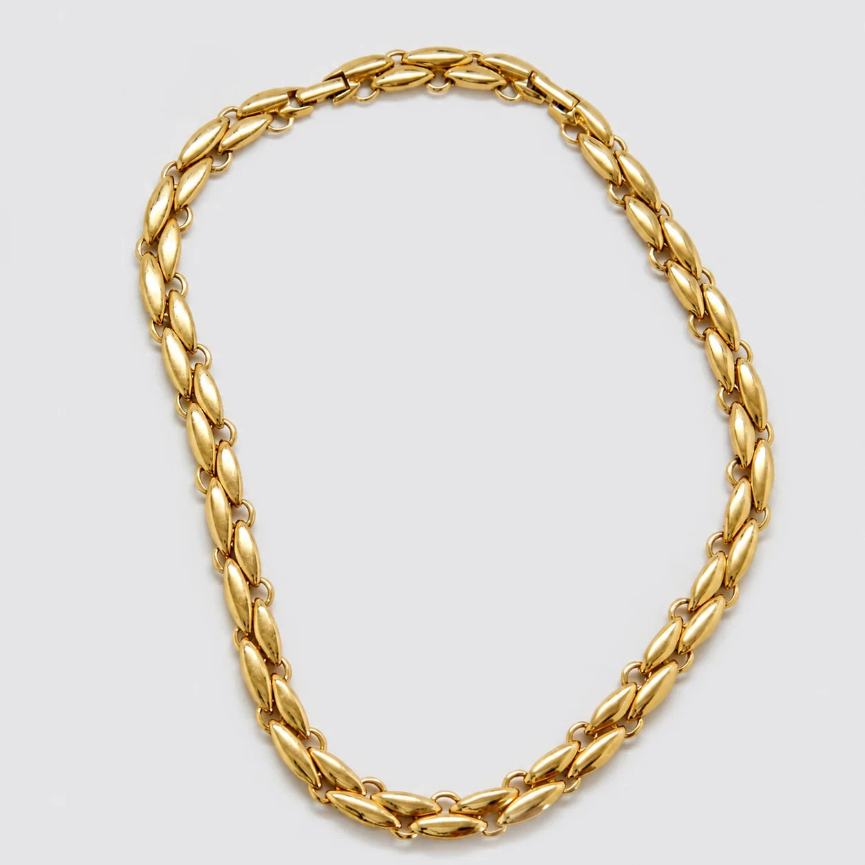 Vintage Monet gold-tone oval link necklace — front