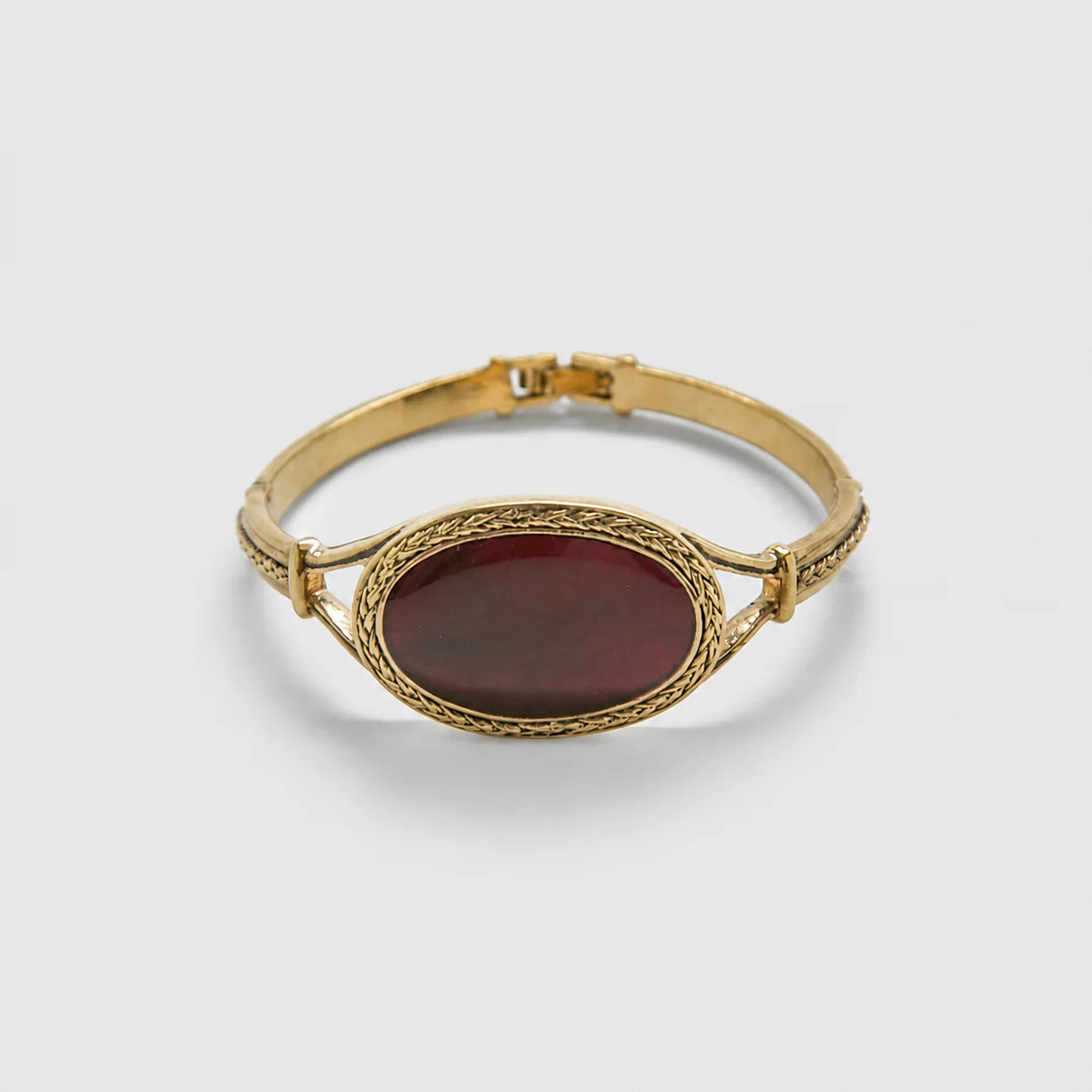 Vintage Monet red cabochon hinged bangle bracelet, front view