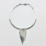 Vintage Monet silver-tone fringe collar necklace on a light gray background