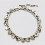 Vintage Monet silver-tone teardrop link necklace — reverse and signature