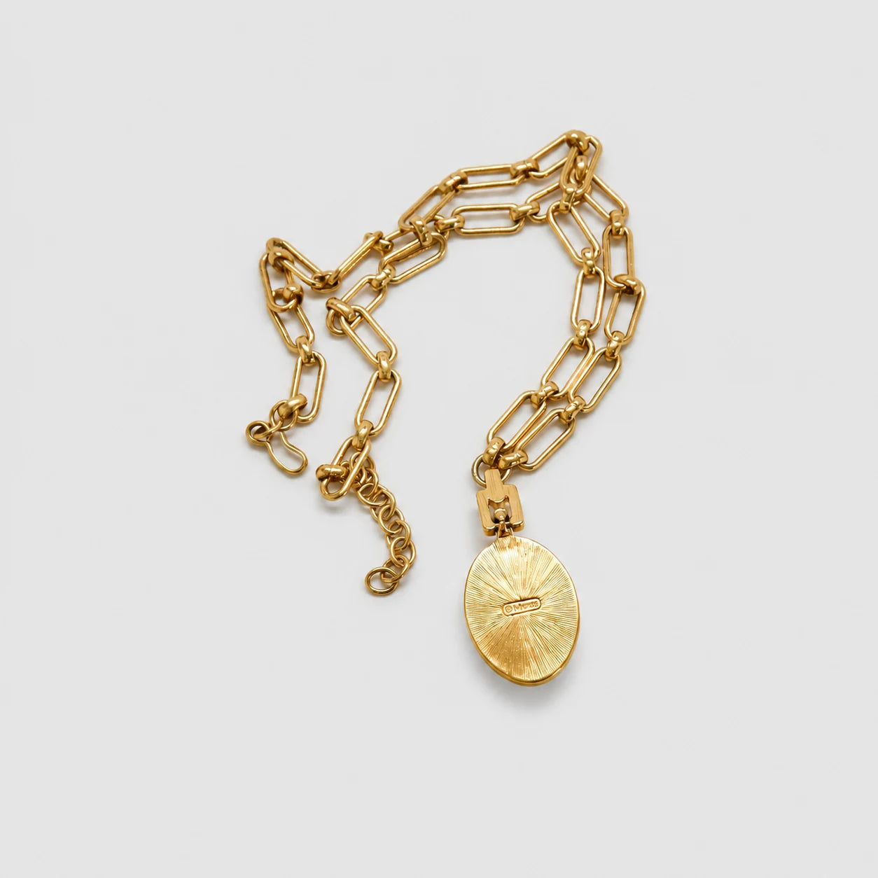 Vintage Monet white oval medallion link necklace — signed pendant back
