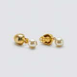 Vintage gold-tone pearl drop clip-on earrings — back and clip detail