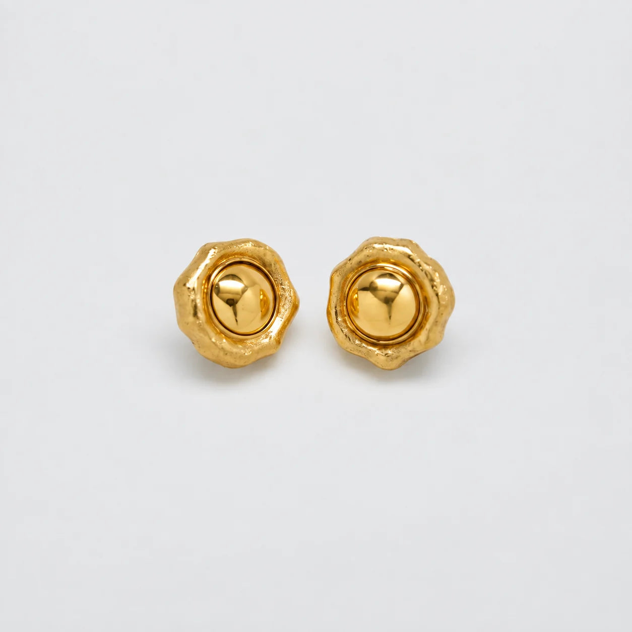 Vintage gold-tone raised dome stud earrings — front
