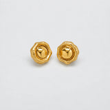 Vintage gold-tone raised dome stud earrings — front