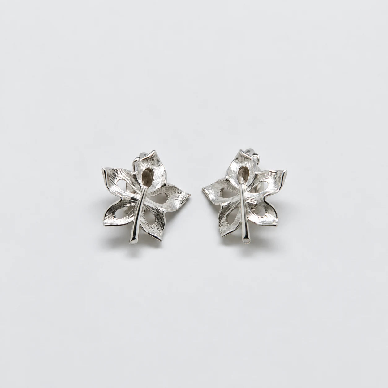 Vintage Silver-Tone Openwork Leaf Earrings — pair detail