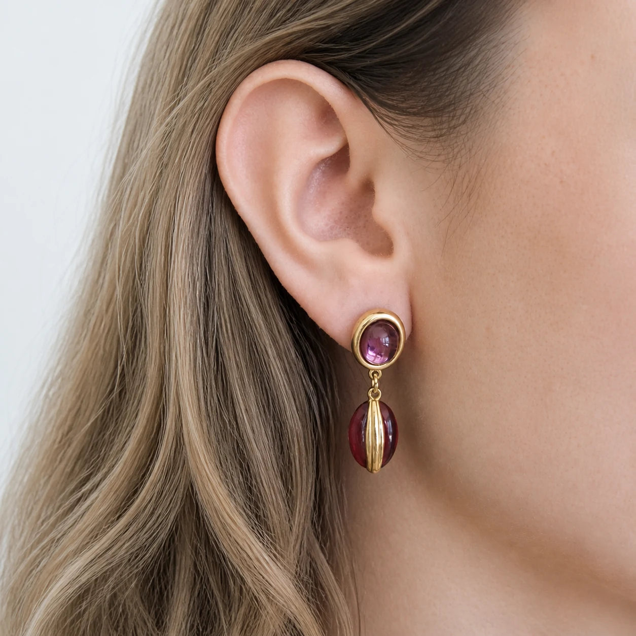 Vintage Swarovski red cabochon drop earrings worn on model