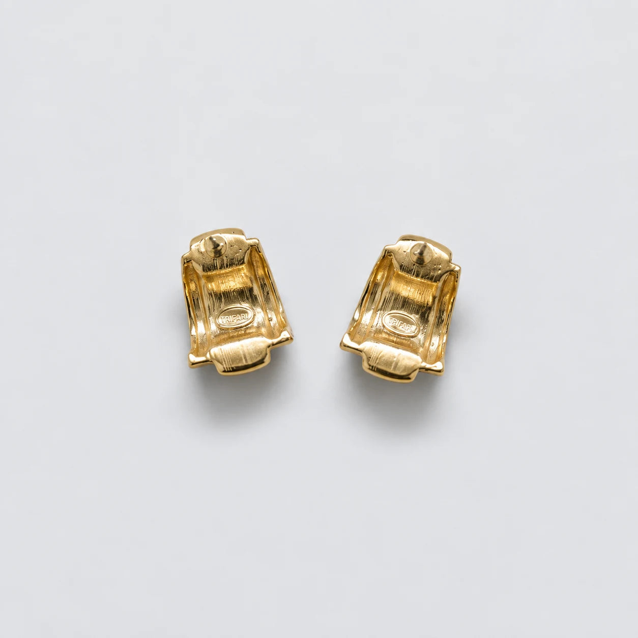 Vintage Trifari Amber and Black Earrings — reverse and Trifari signatures