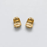 Vintage Trifari Amber and Black Earrings — reverse and Trifari signatures