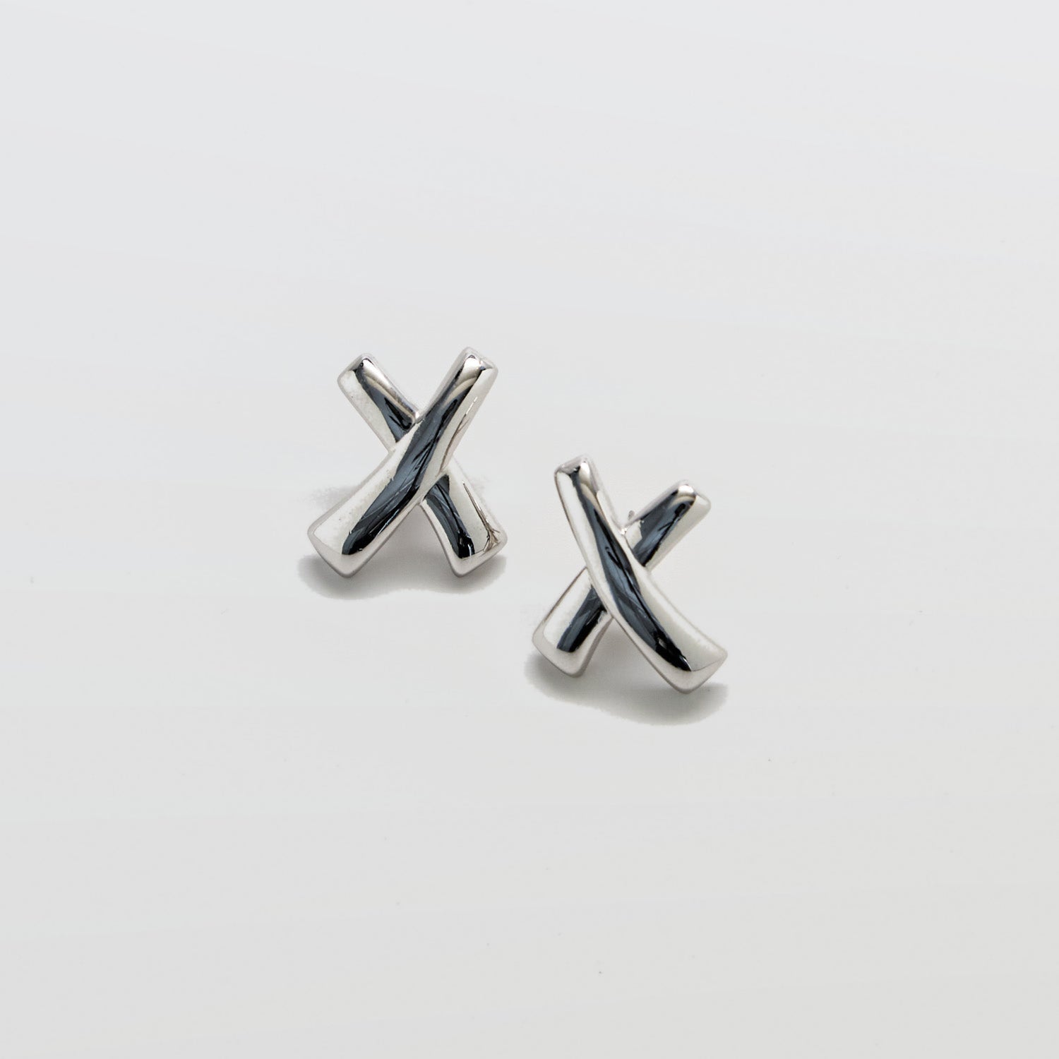 Monet Silver-Tone Crossover Stud Earrings - Admiral Row