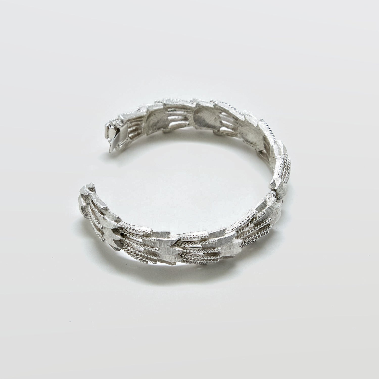 Silver bracelet on a white background