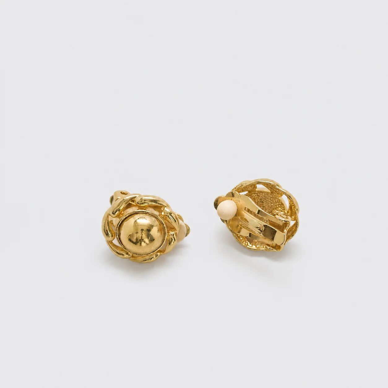 Vintage Anne Klein gold-tone medallion clip-on earrings, clip-back detail