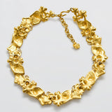Vintage Givenchy gold-tone floral collar necklace, reverse and clasp detail