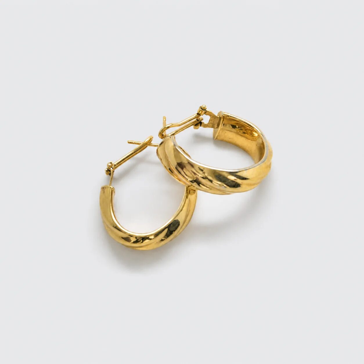 Vintage Monet gold-tone twist hoop earrings, clasp detail