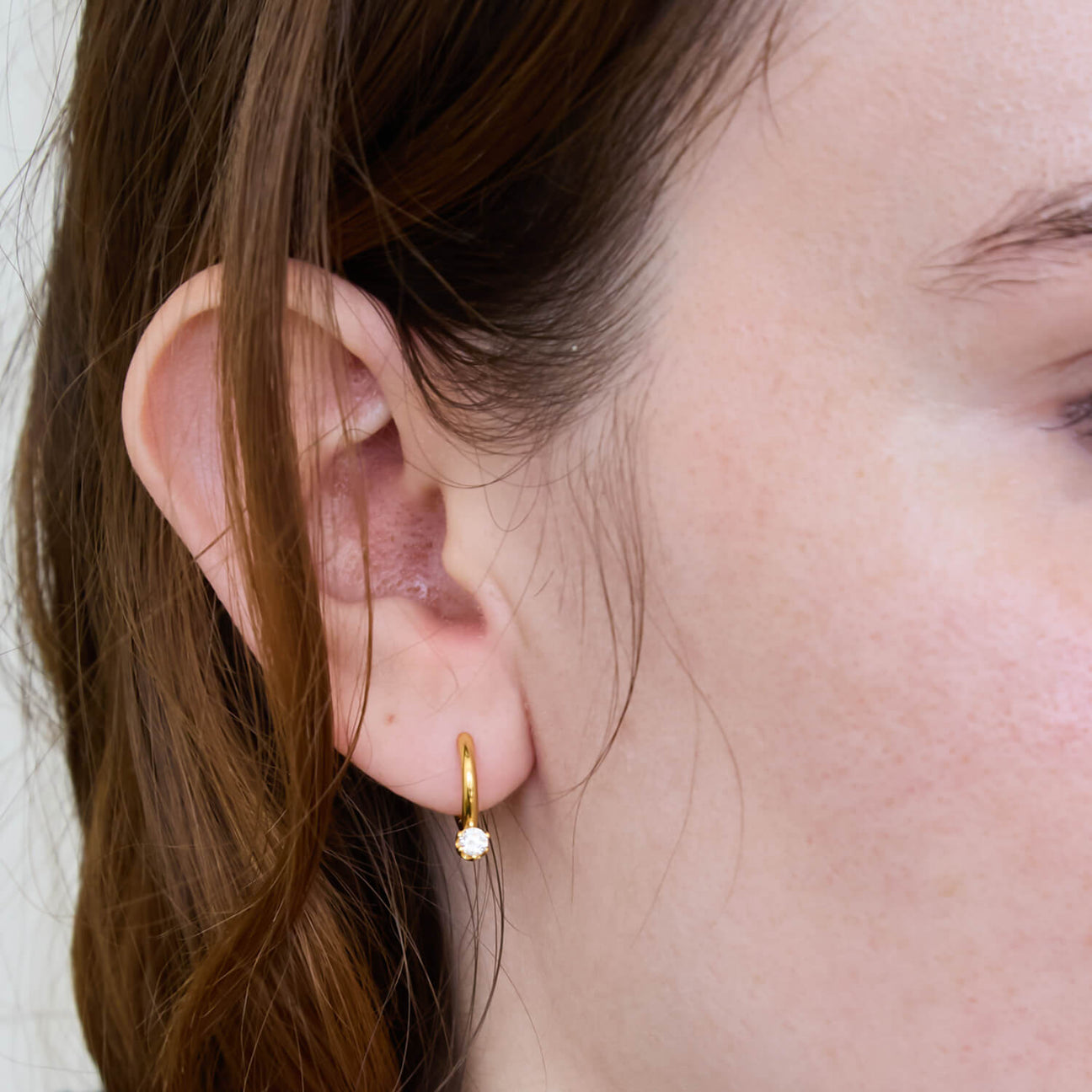White Pave Round Huggie Earrings